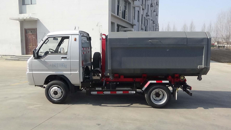 Camion à ordures à compression amovible de type boîte